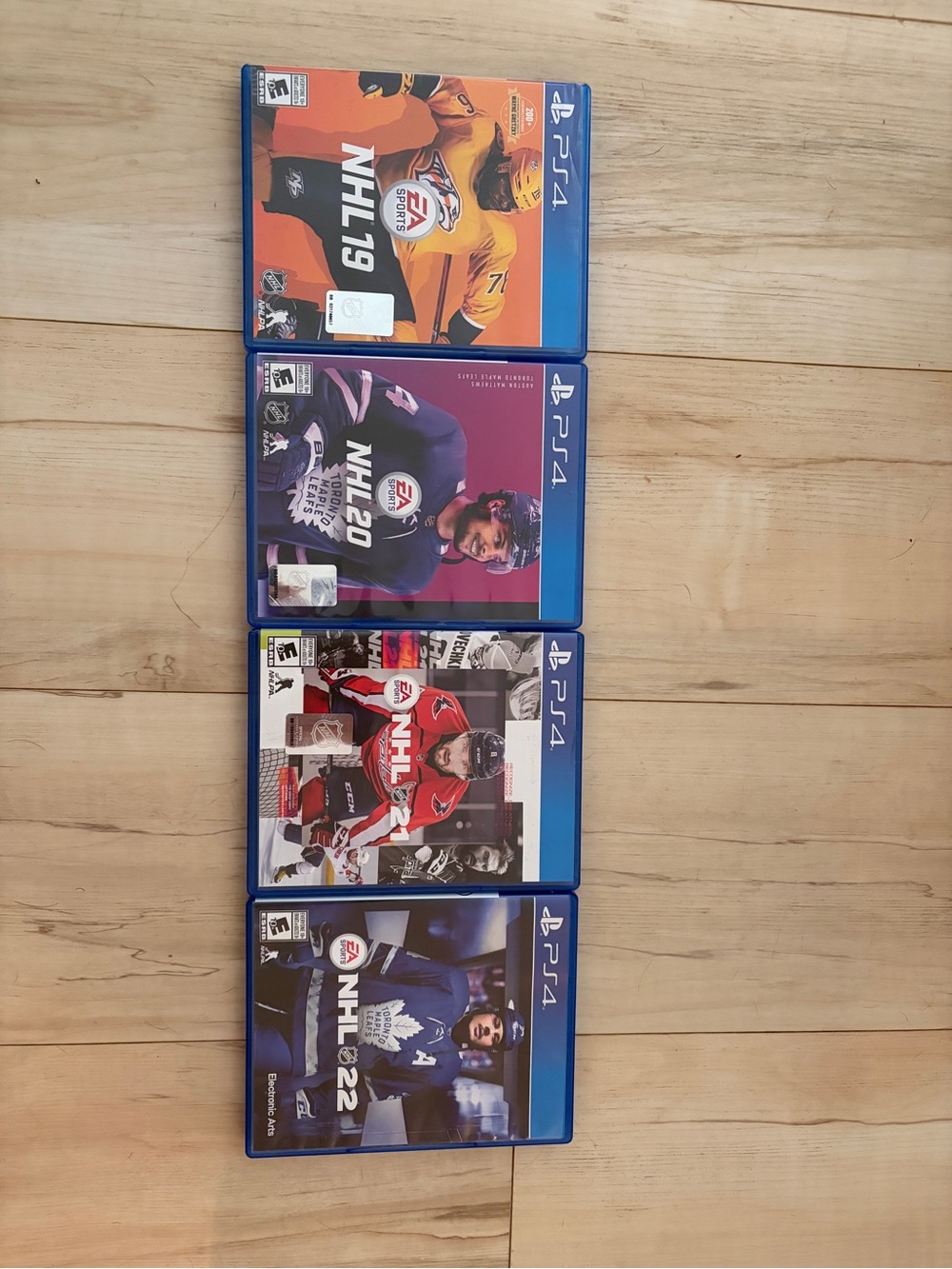 EA Sports NHL PS4 Game Bundle - Multicolor Covers (Red, Purple, Black, Blue)